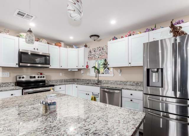 Property at 930 E Friar Ave, Apache Junction, AZ 85119, 4 beds, 2 baths