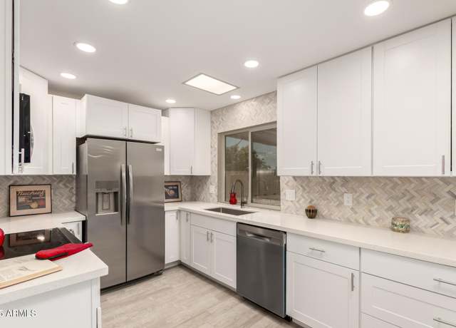 Property at 9713 W Raintree Dr, Sun City, AZ 85351, 3 beds, 3 baths