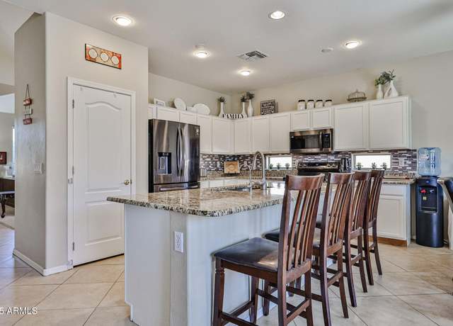 Property at 18047 W Caribbean Ln, Surprise, AZ 85388, 5 beds, 3.5 baths