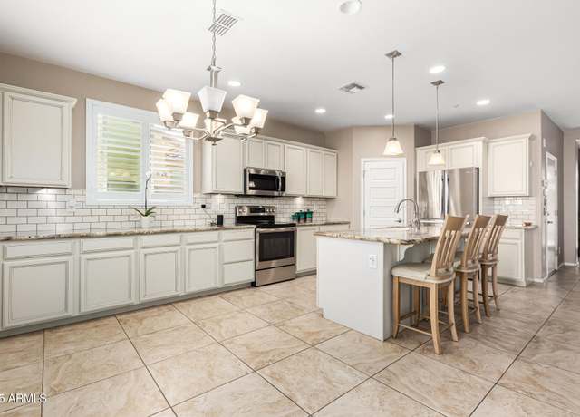 Property at 9144 W Surrey Dr, Peoria, AZ 85381, 4 beds, 3 baths