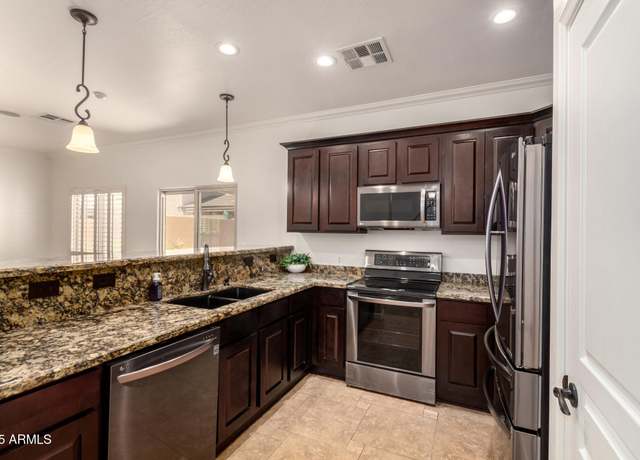 Property at 8838 W Aster Dr, Peoria, AZ 85381, 3 beds, 2.5 baths