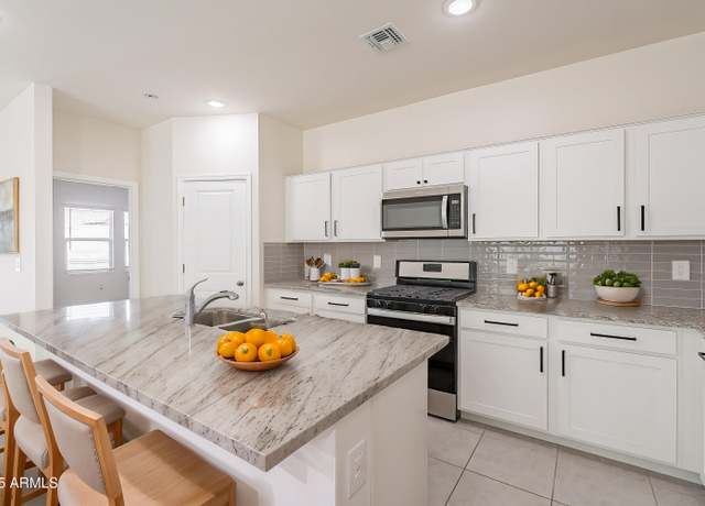 Property at 19354 W Coolidge St, Litchfield Park, AZ 85340, 4 beds, 3 baths