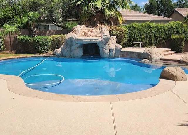 Property at 940 W Macaw Dr, Chandler, AZ 85286, 5 beds, 4 baths