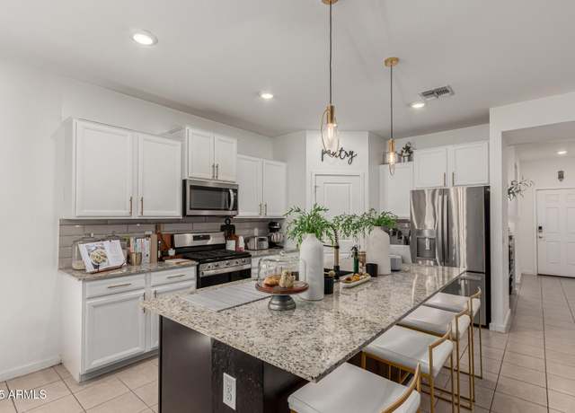 Property at 14114 W Surrey Dr, Surprise, AZ 85379, 4 beds, 3 baths