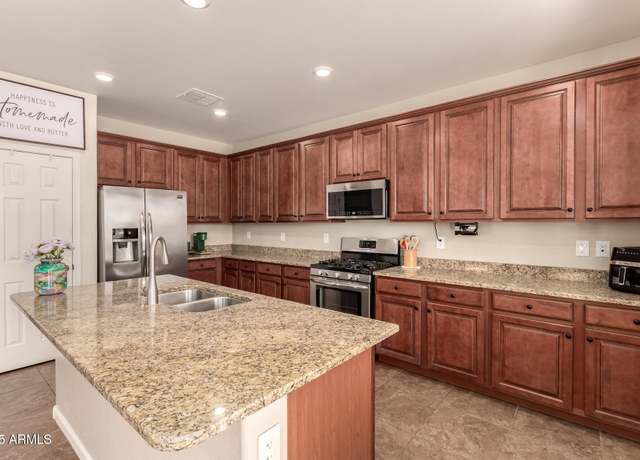 Property at 13123 W Cottontail Ln, Peoria, AZ 85383, 5 beds, 3 baths