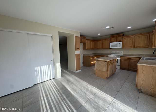Property at 1352 S 221st Ln, Buckeye, AZ 85326, 4 beds, 3 baths