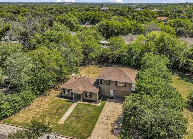 Property at 1009 S Brazos St, Weatherford, TX 76086, 4 beds, 2 baths