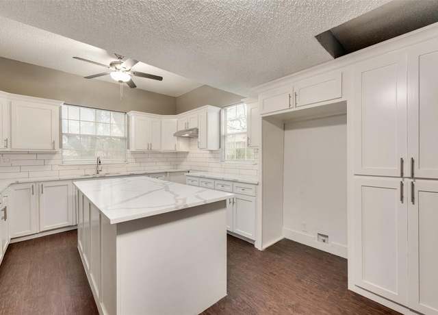 Property at 909 W E Ave E, Garland, TX 75040, 6 beds, 3 baths