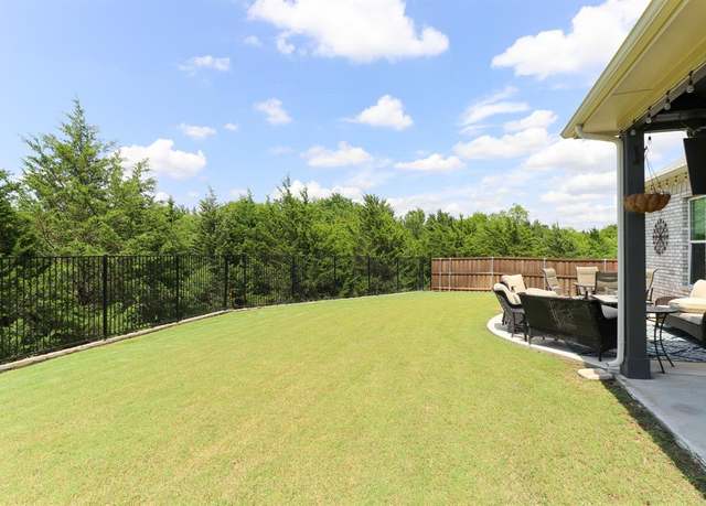 Property at 1056 Olympic Dr, Rockwall, TX 75087, 4 beds, 3.5 baths