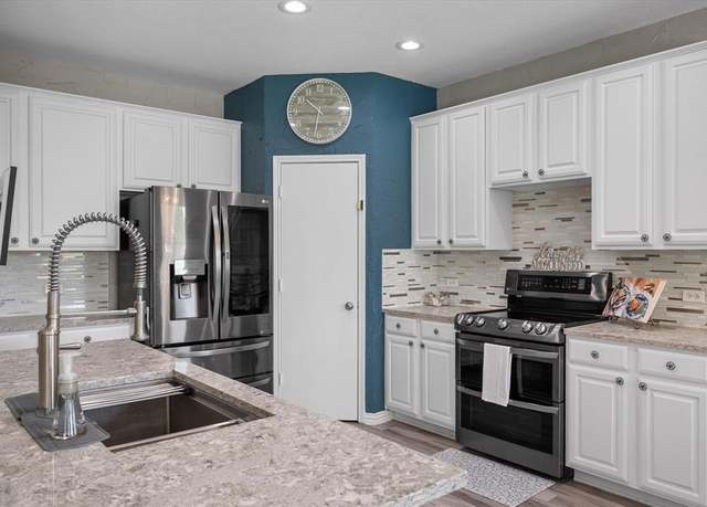 Property at 1612 Marble Cove Ln, Denton, TX 76210, 5 beds, 2.5 baths