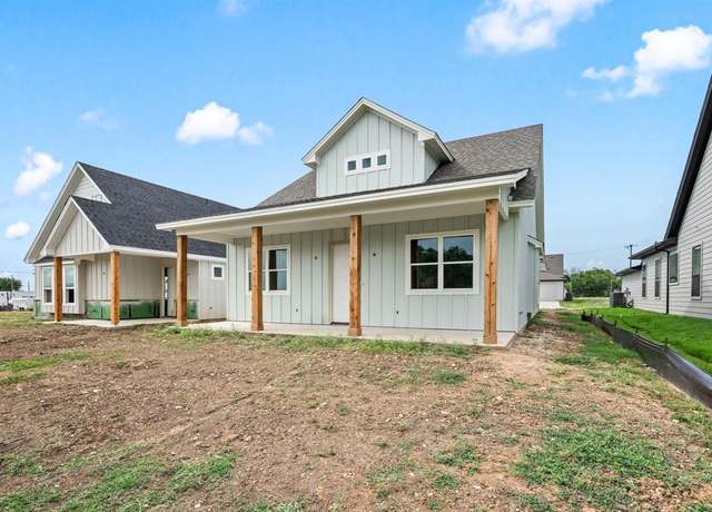 Property at 207 W 7th St, Justin, TX 76247, 4 beds, 3 baths
