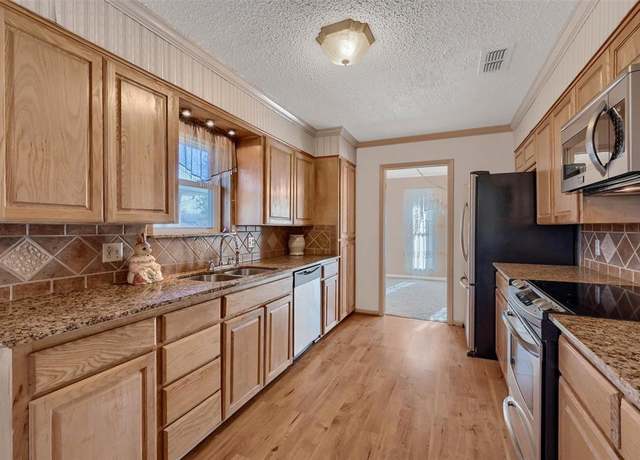 Property at 409 Holland Dr, Denison, TX 75020, 3 beds, 2 baths