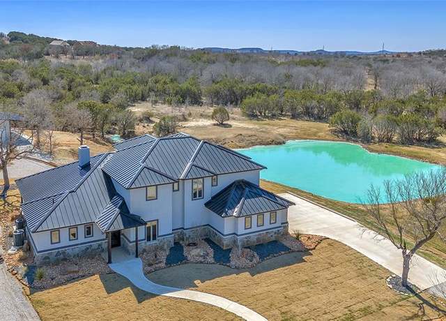Property at 1048 Mountain Bluebird Ct, Graford, TX 76449, 6 beds, 4.5 baths