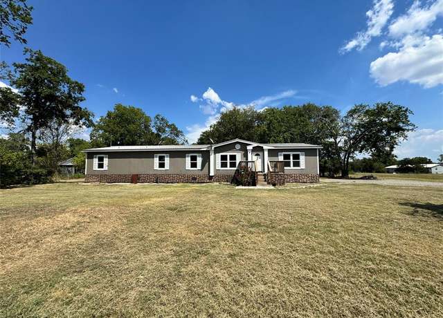Property at 111 S Houston St, Wolfe City, TX 75496, 4 beds, 3 baths