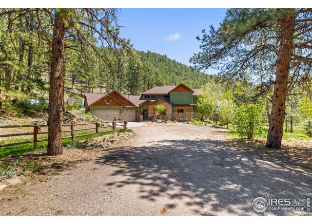 Property at 952 Skinner Gulch Rd, Loveland, CO 80537, 4 beds, 2.5 baths