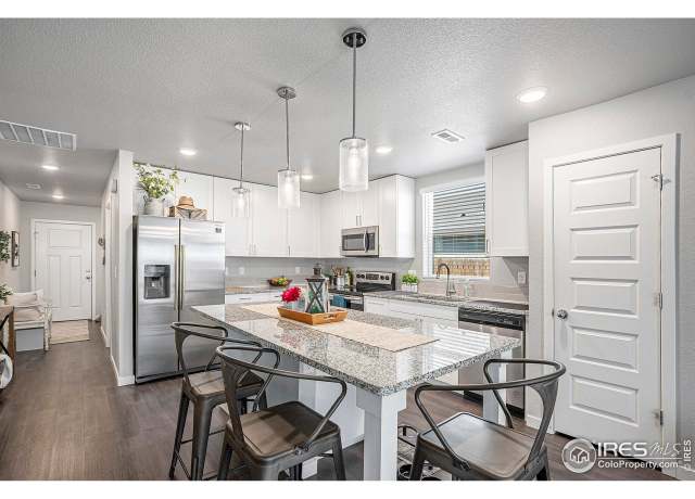 Property at 403 11th Ave, Wiggins, CO 80654, 3 beds, 2 baths