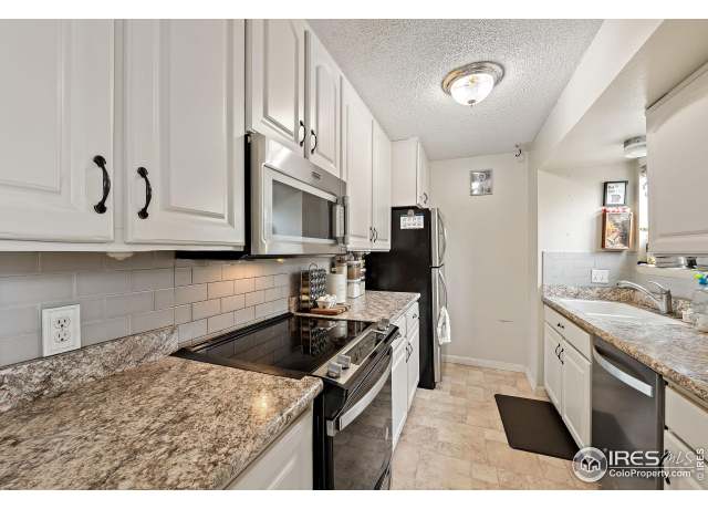 Property at 1616 Longbow Ct, Lafayette, CO 80026, 3 beds, 2 baths