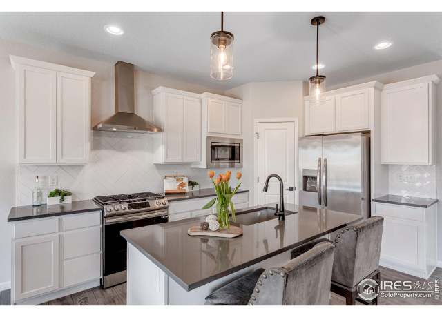 Property at 244 Hillspire Dr, Windsor, CO 80550, 5 beds, 3.5 baths
