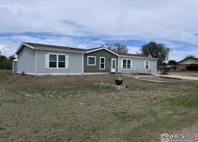 Property at 301 4th Ave, Wiggins, CO 80654, 4 beds, 2 baths