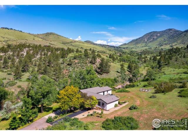 Property at 1200 Ponderosa Hill Rd, Lyons, CO 80540, 5 beds, 3.5 baths