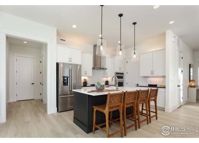 Property at 1611 Poplar Dr, Erie, CO 80516, 4 beds, 4.5 baths