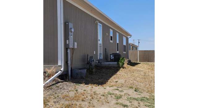 Photo of 219 Larch Dr, Log Lane Village, CO 80705