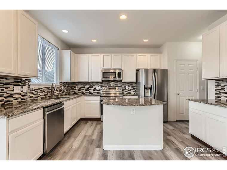 Photo of 4948 Spinning Wheel Dr Brighton, CO 80601