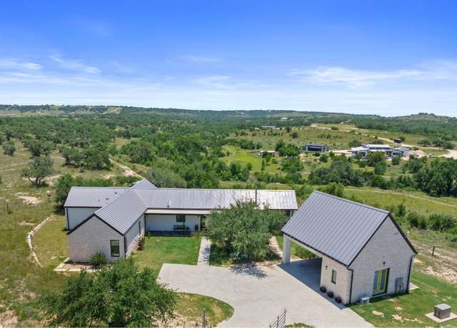 Property at 577 Cattle Creek Rd, Johnson City, TX 78636, 4 beds, 4 baths