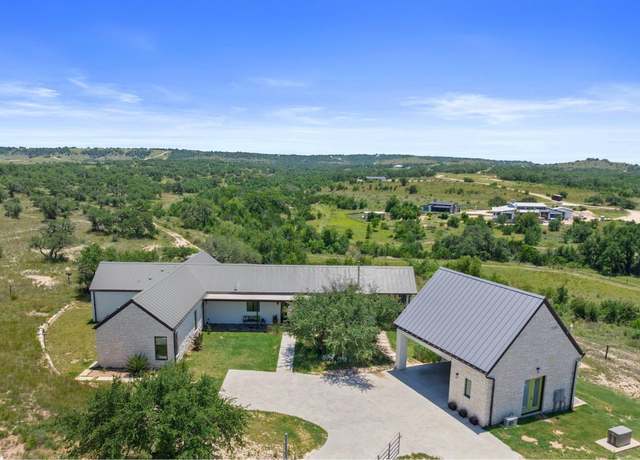 Property at 577 Cattle Creek Rd, Johnson City, TX 78636, 4 beds, 4 baths