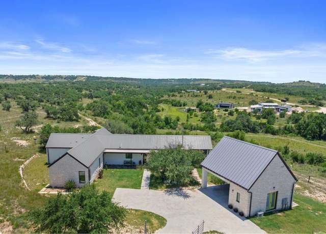 Property at 577 Cattle Creek Rd, Johnson City, TX 78636, 4 beds, 4 baths