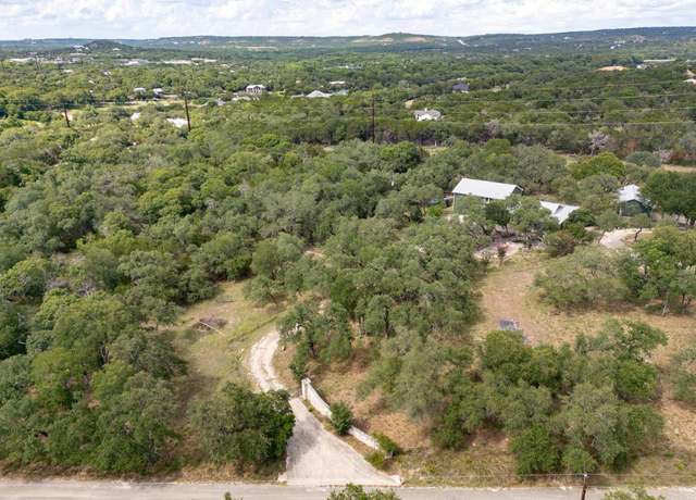 Property at 1100 Chapparal Dr, Wimberley, TX 78676, 3 beds, 3.5 baths