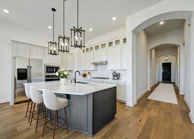Property at 8017 Royal Mint Cv, Lago Vista, TX 78645, 4 beds, 3 baths