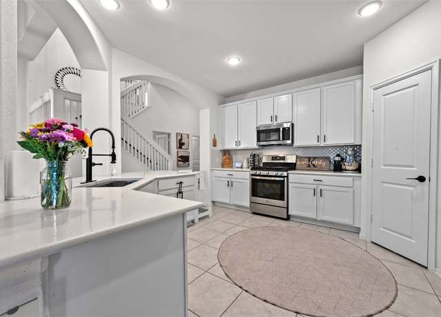 Property at 202 Banana St, Buda, TX 78610, 4 beds, 4 baths