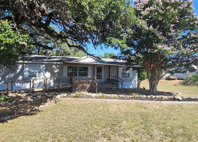 Property at 103 Moss Rock Dr, Johnson City, TX 78636, 4 beds, 2 baths