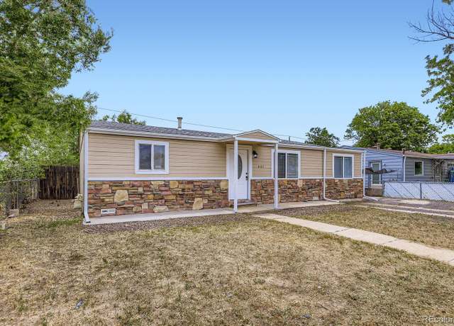 Property at 7461 Locust St, Commerce City, CO 80022, 4 beds, 2 baths