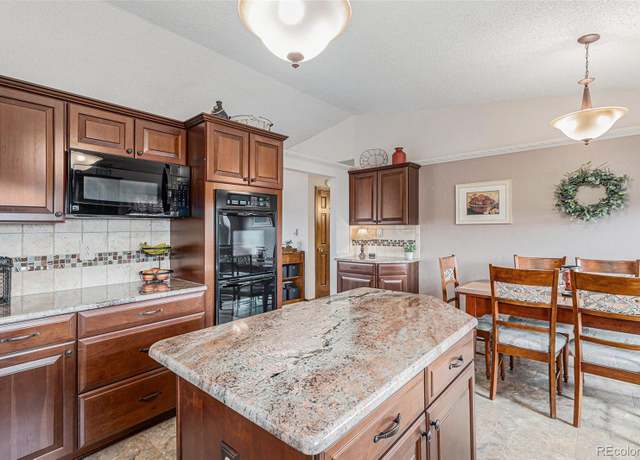 Property at 1095 Lake Woodmoor Dr, Monument, CO 80132, 4 beds, 3 baths