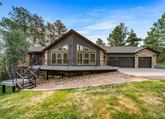 Property at 7596 Rollins Dr, Larkspur, CO 80118, 5 beds, 4 baths
