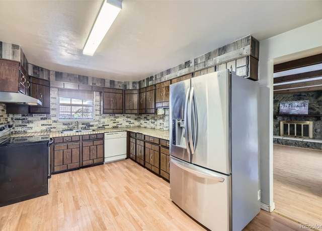 Property at 661 S Paris St, Aurora, CO 80012, 5 beds, 3 baths