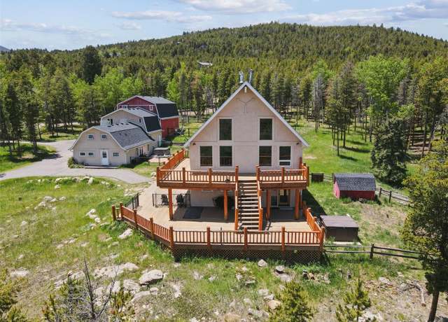 Property at 31551 Black Widow Dr, Conifer, CO 80433, 5 beds, 3 baths