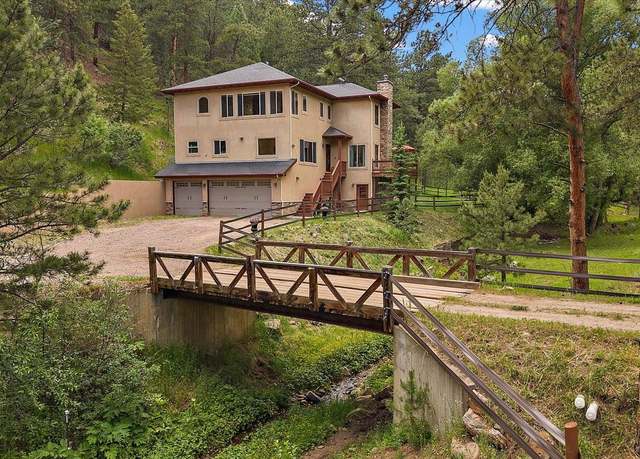 Property at 27756 Troublesome Gulch Rd, Evergreen, CO 80439, 3 beds, 4 baths