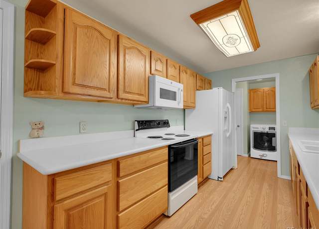 Property at 7037 S Newland St, Littleton, CO 80128, 4 beds, 3 baths
