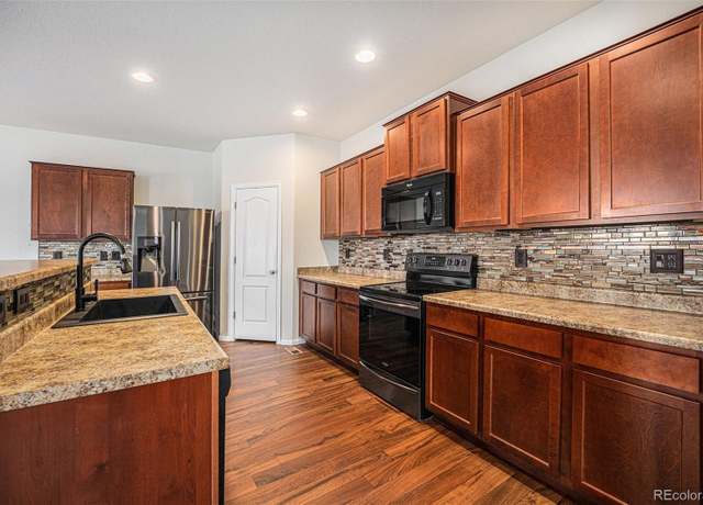 Property at 1788 Taos St, Brighton, CO 80603, 4 beds, 3 baths