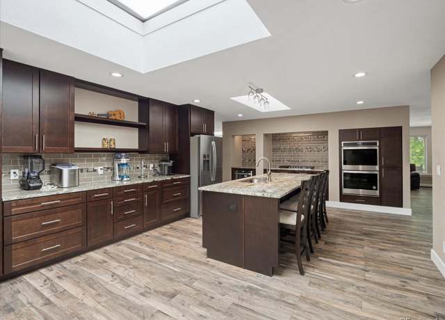 Property at 8233 W 62nd Pl, Arvada, CO 80004, 4 beds, 4 baths
