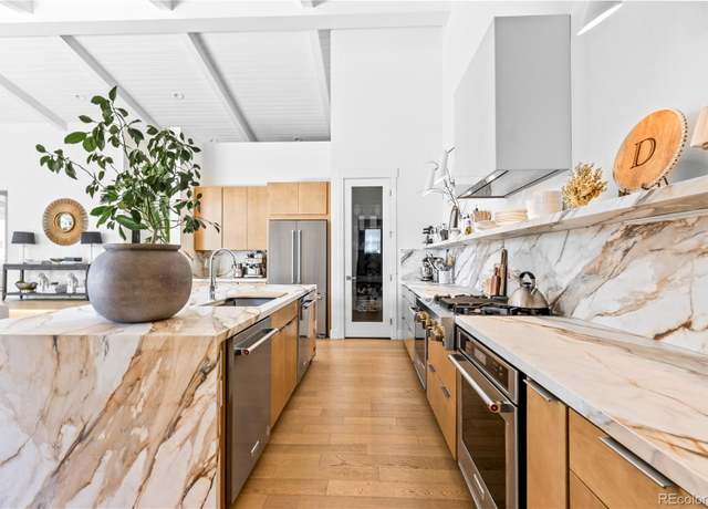 Property at 10307 E 61st Ave, Denver, CO 80238, 5 beds, 5 baths