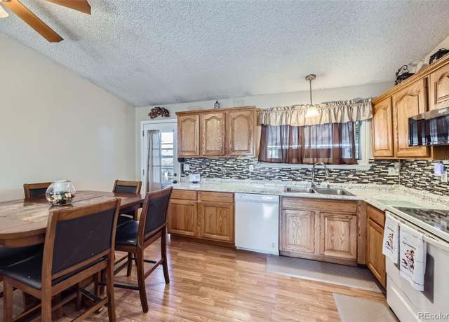 Property at 12425 Bellaire Dr, Thornton, CO 80241, 4 beds, 2 baths