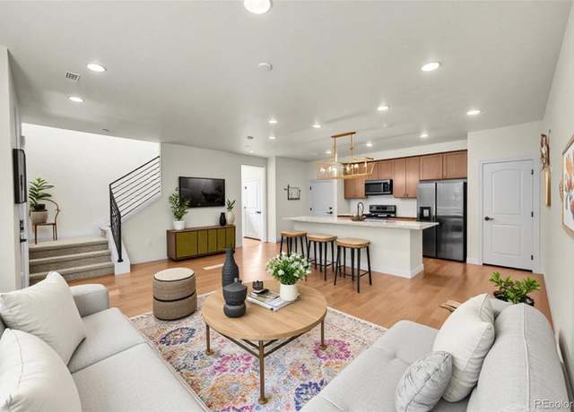 Property at 16818 E 119th Ave Unit A, Commerce City, CO 80022, 3 beds, 3 baths
