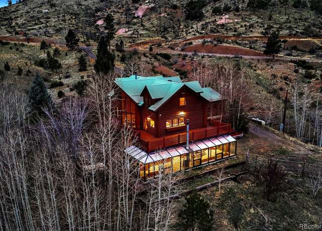 Property at 15690 Cochise Trl, Pine, CO 80470, 4 beds, 4 baths