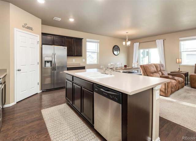 Property at 19468 E 65th Pl, Aurora, CO 80019, 3 beds, 2 baths