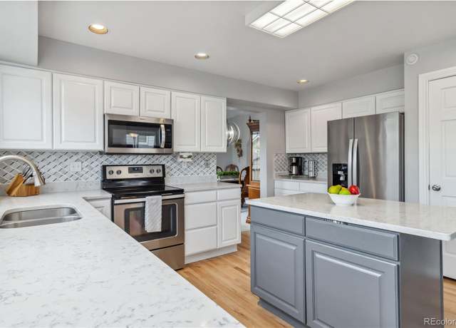 Property at 12551 W 84th Cir, Arvada, CO 80005, 4 beds, 3 baths