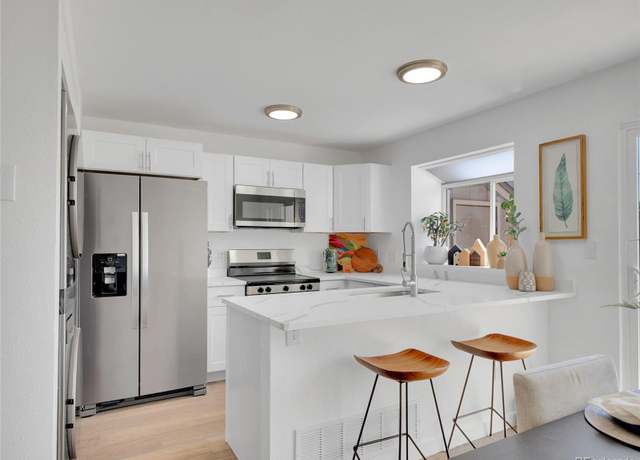 Property at 9658 W Chatfield Ave Unit D, Littleton, CO 80128, 2 beds, 3 baths